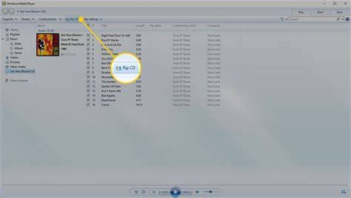How do I transfer music from Windows Media Player to a flash drive?